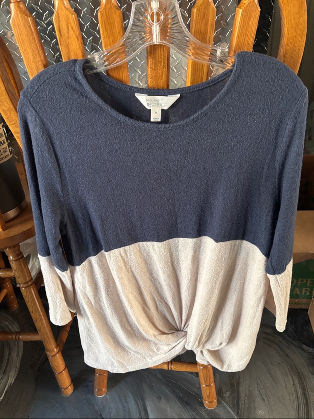 Twist front cream and blue sweater top